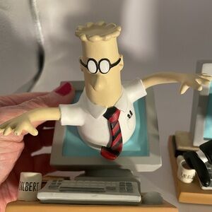 Dilbert Book Ends Moving Legs And Upper Torso At The Office
